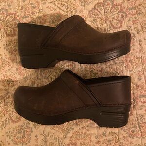 Brown leather clogs
